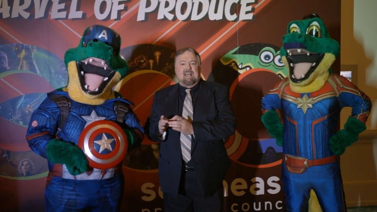 Chip and two alligators dressed as superheroes.