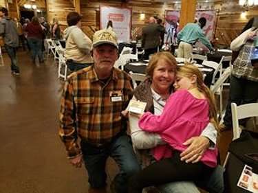 Jim, Barbara and grandchild.