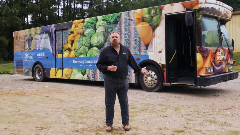 Chip in front of Ripe Revival mobile market.