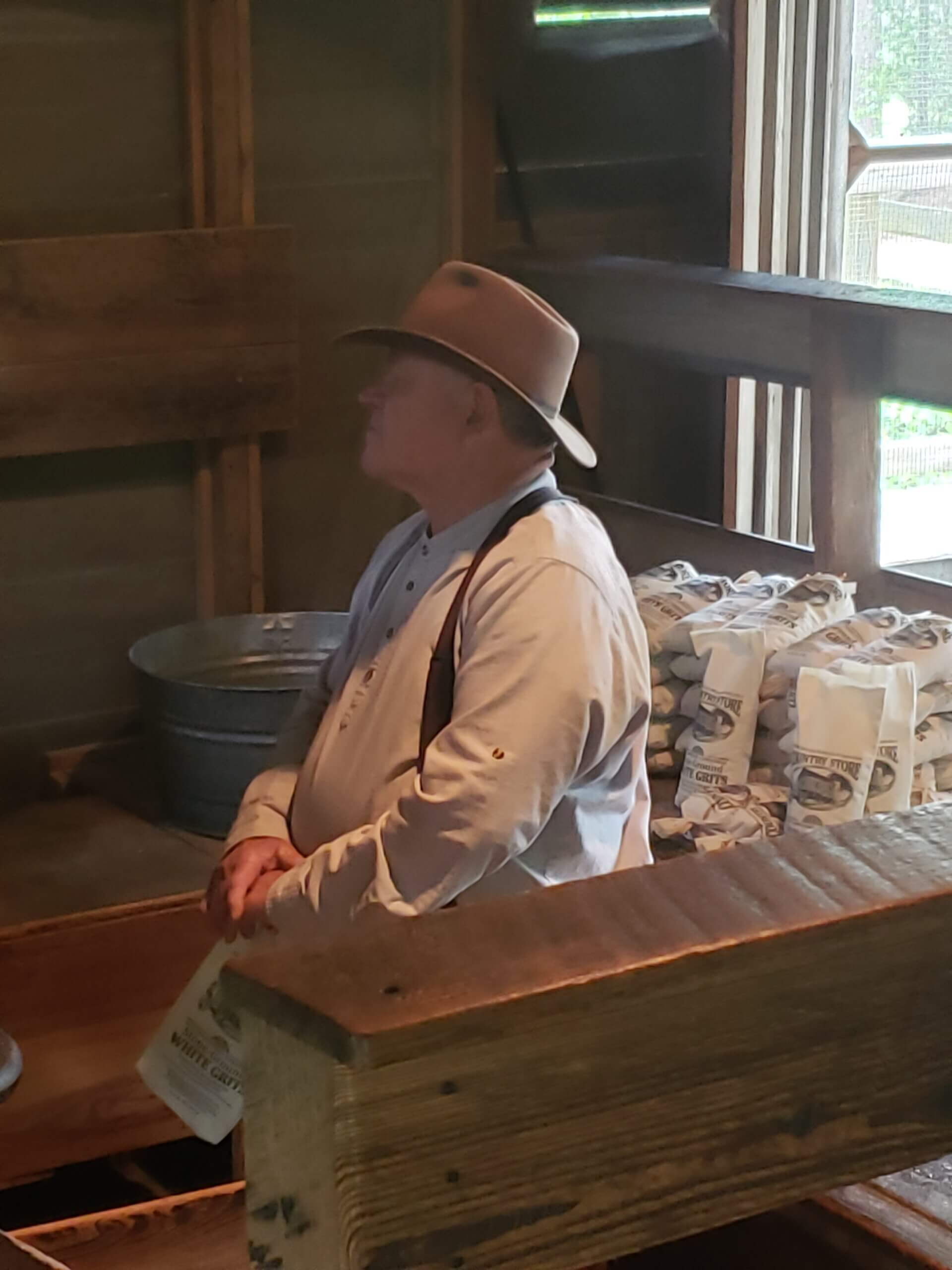 Mr. Jonny Fordham sitting in Davis Grist Mill.