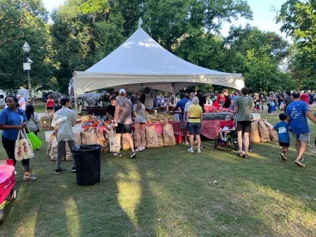 Supporters at farm stand.