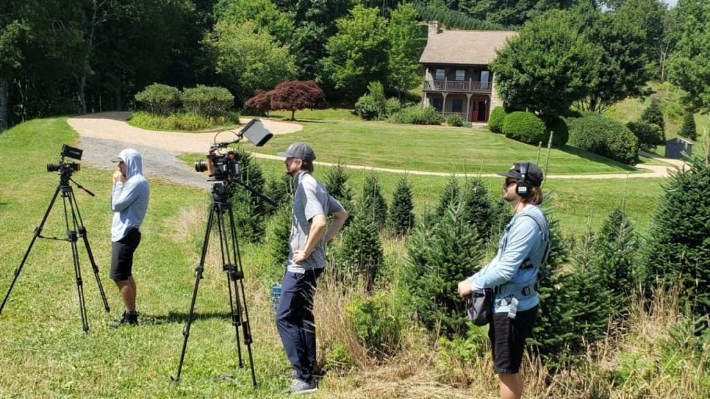 Crew filming in front of Larry's house.