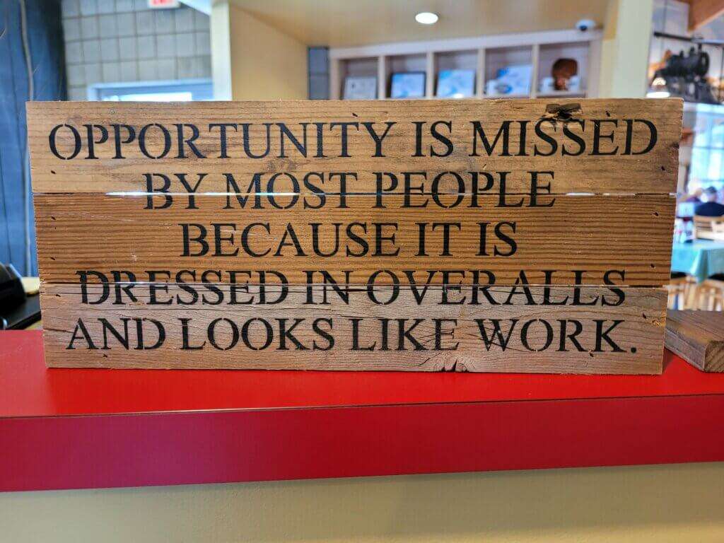 "Opportunity Is Missed" sign.