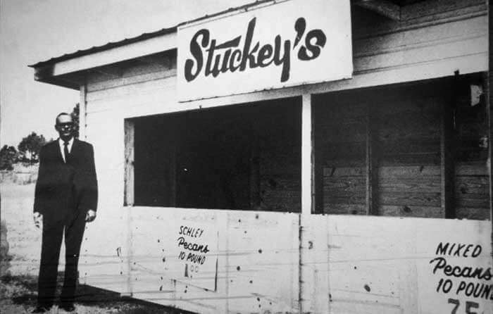 W.S. Stuckey in front of his store.