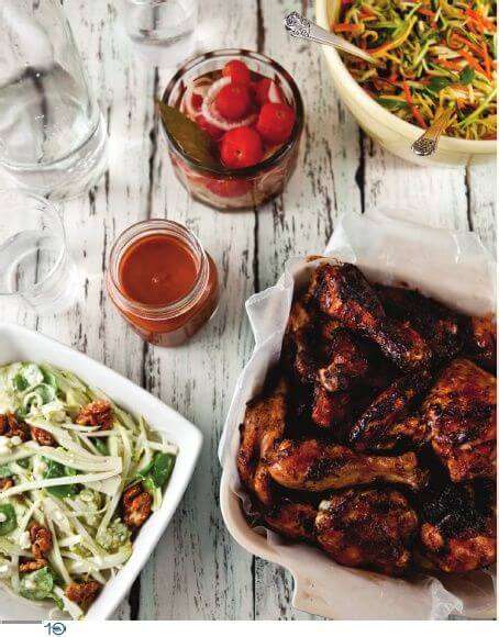 Bourbon BBQ Chicken with southern sides on a picnic table