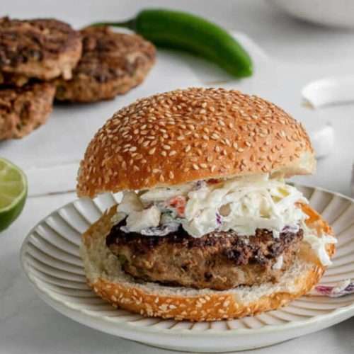 Jalapeno Turkey Burger with slaw on top.