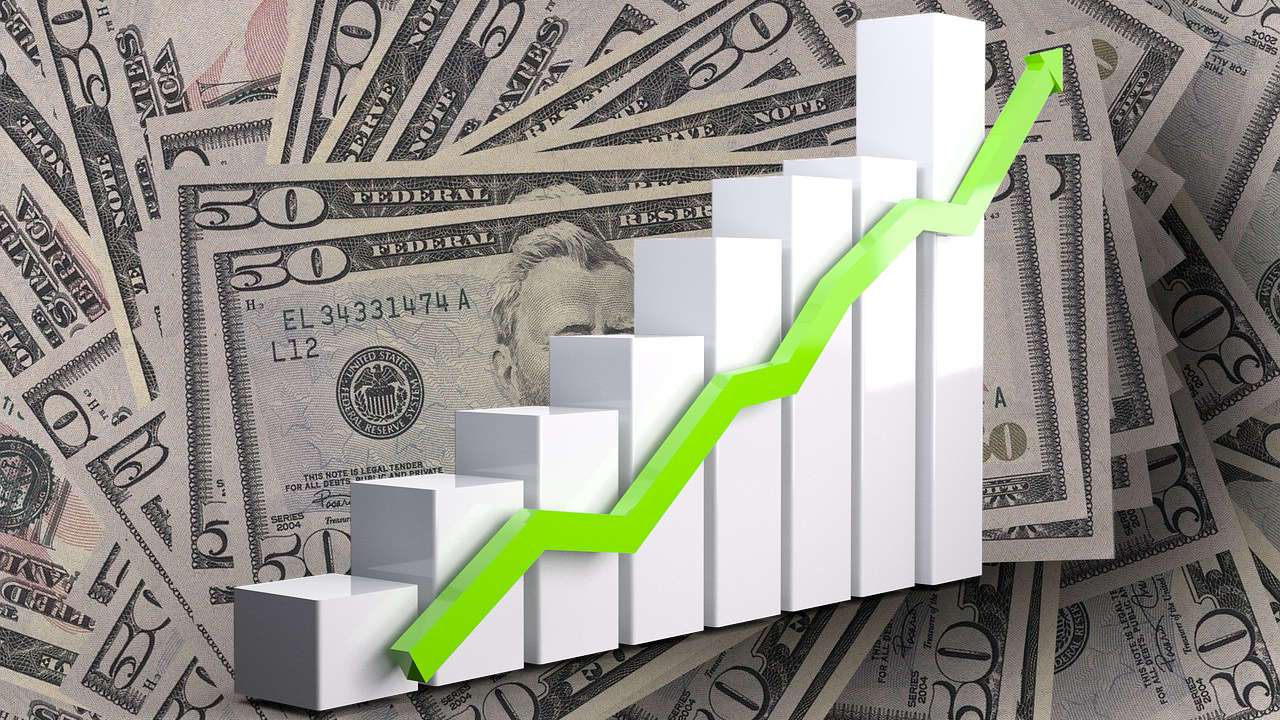 $50 bills with increase arrow overlay depicting rise in costs. 