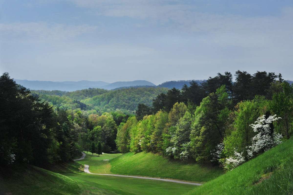 Image of a golf course in the mountains.