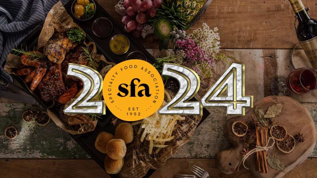 Trendy foods on a table with '2024' overlay with Specialty Food Association logo as the '0'.