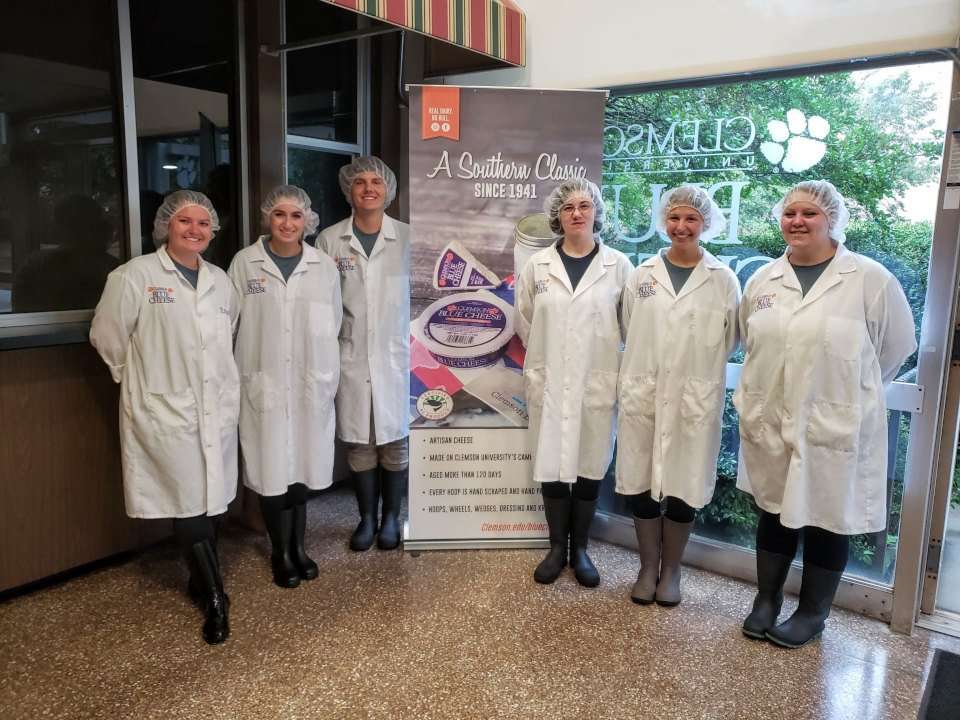 Clemson University student assistants for cheese making.