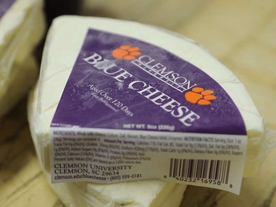 Wedge of Clemson Blue Cheese still in the packaging.