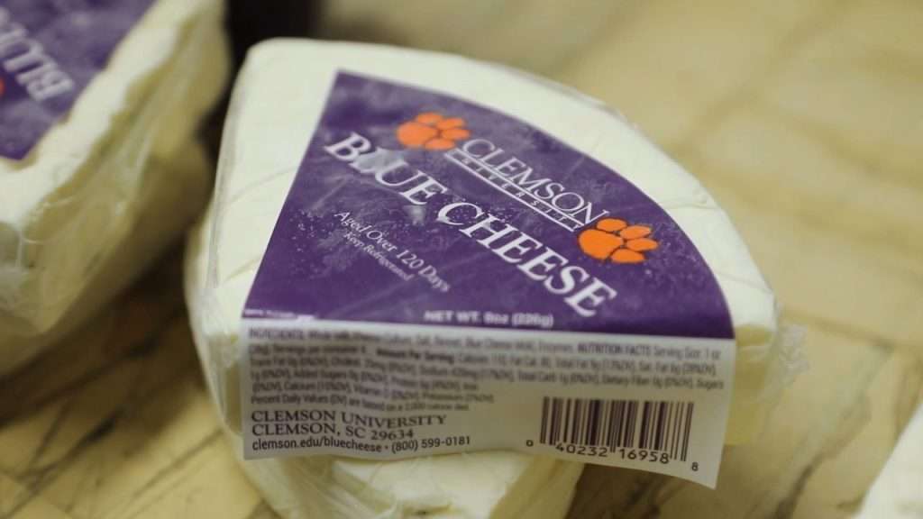 Wedge of Clemson Blue Cheese still in the packaging.