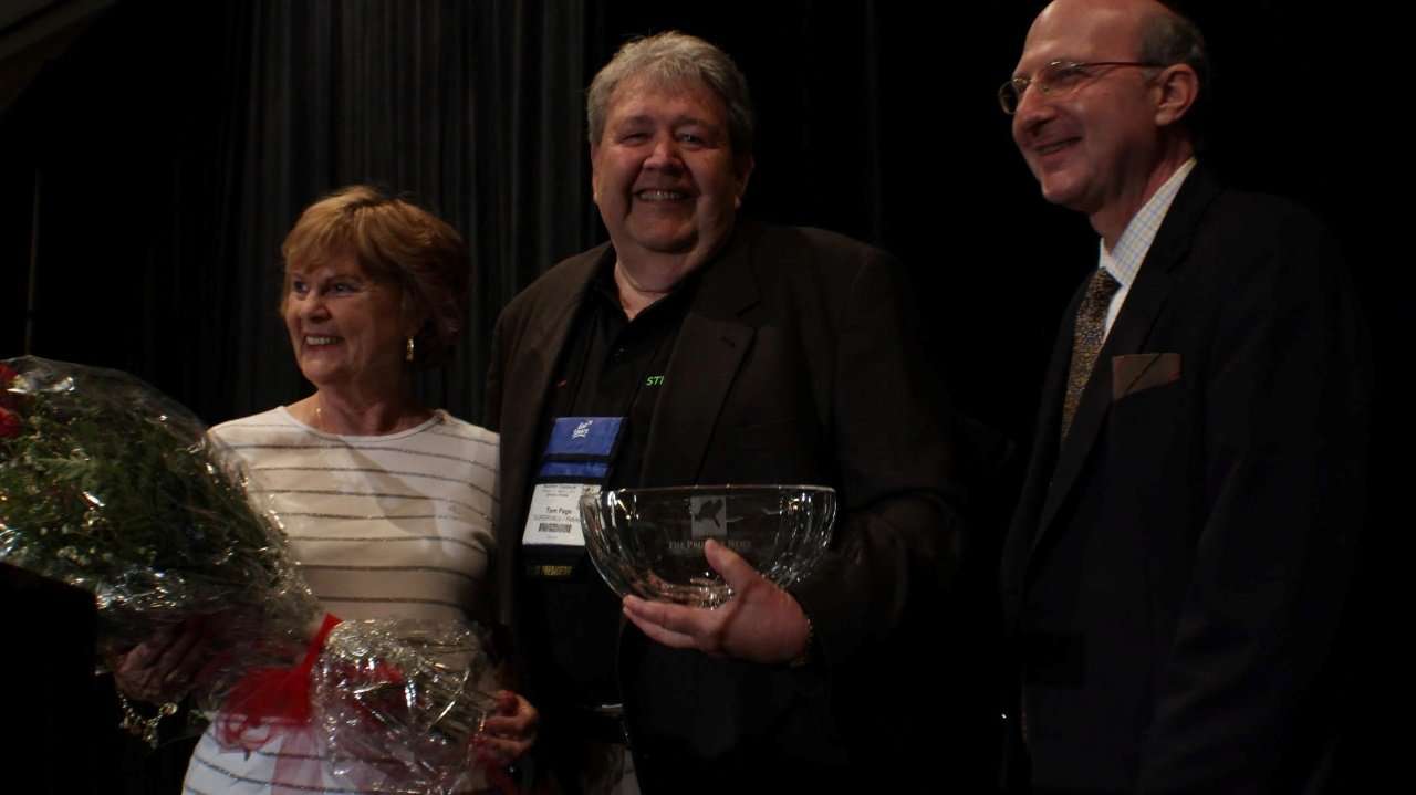 Tom Page on stage with wife Shirly and Terry Vorhees.