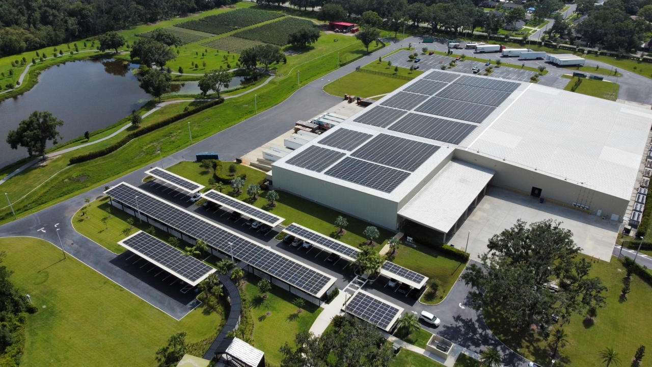 Aerial view of Wish Farms production facility with new solar panel installation.
