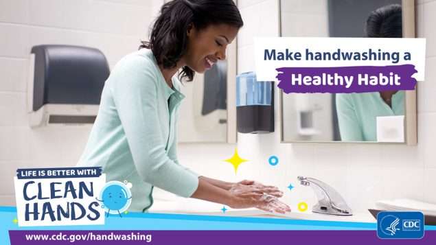 CDC handwashing poster with lady by a sink in a public bathroom.