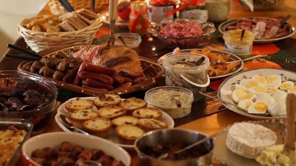 Dinner table loaded with assorted fresh foods.