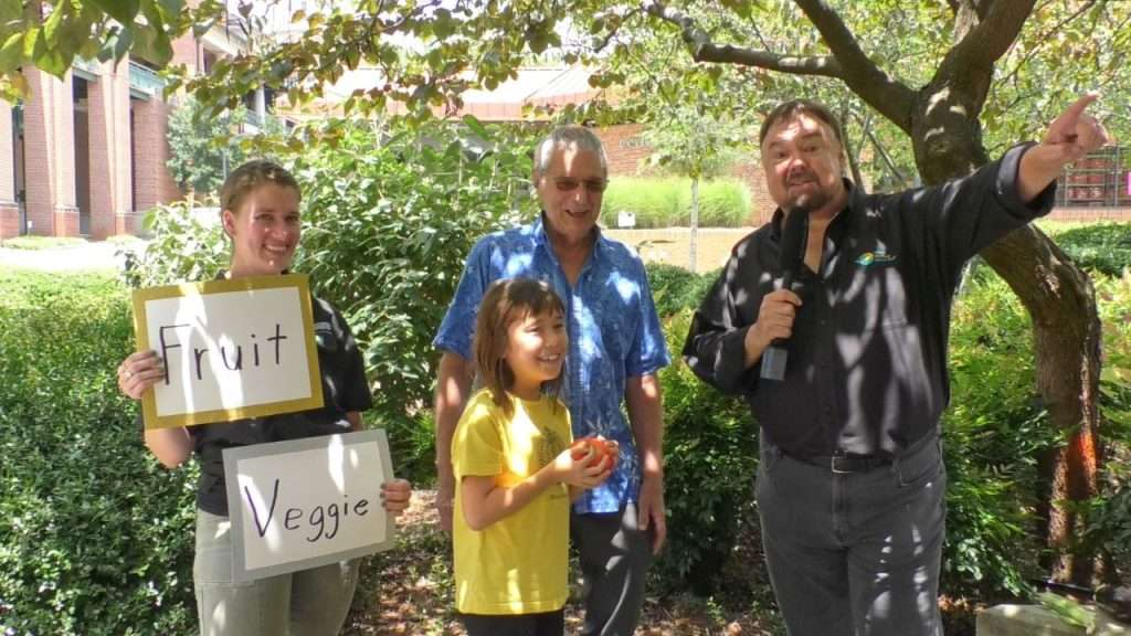 Chip with 'Fruit Or Veggie?!' gameshow contestants.