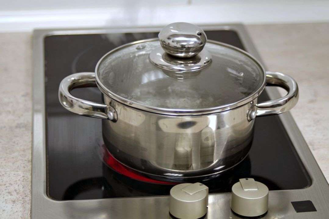 Stockpot on electric stove.