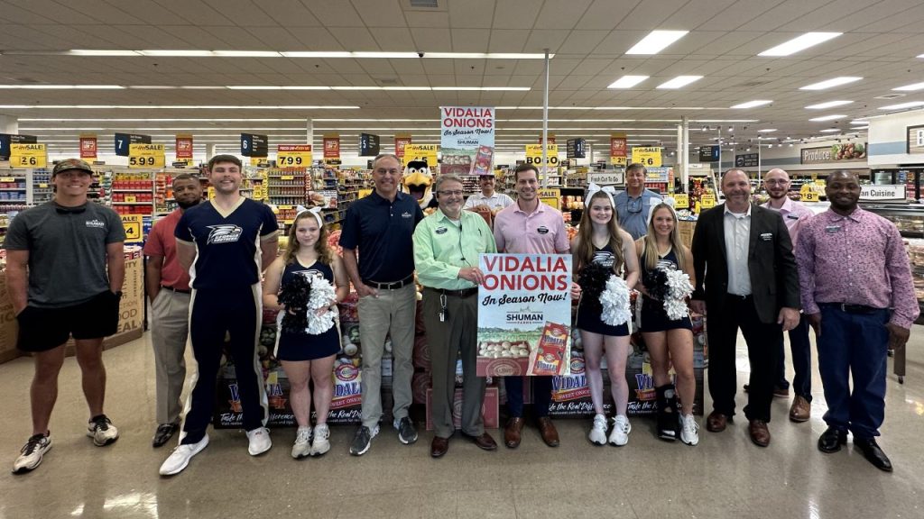 John Shuman and his crew at a Food Lion grocery.