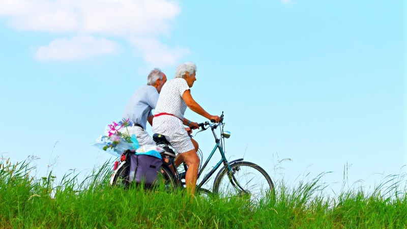 Older active adults riding bikes.