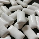 Closeup of sugar free gum pieces on a table.