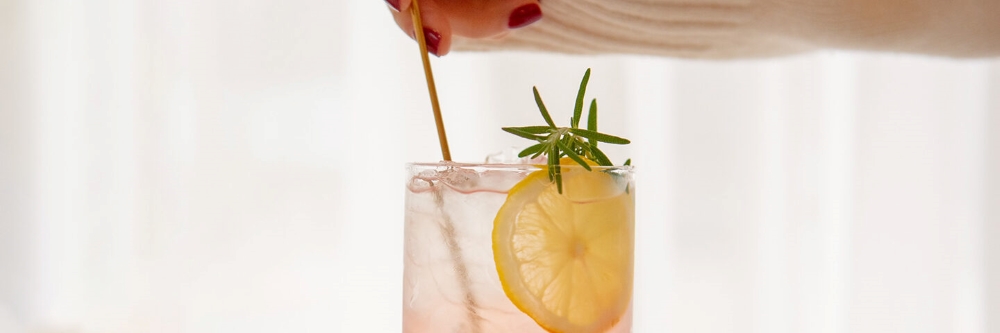 Water infused with lemon and rosemary.