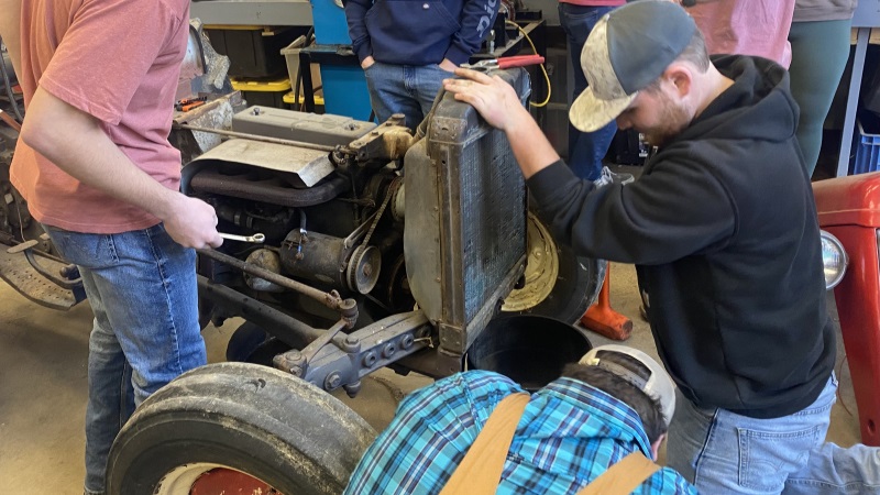 TN Tech students learning to work on tractors.