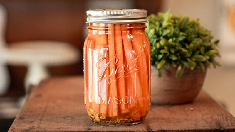 Jar of pickled carrots.