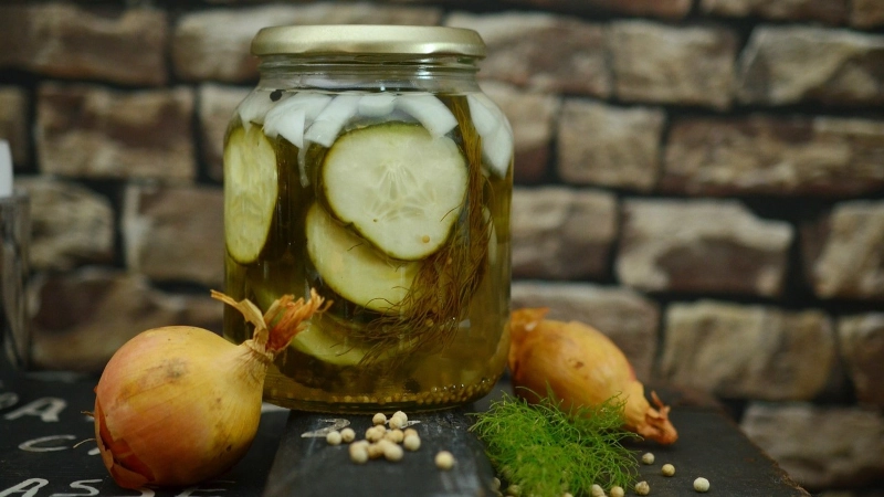 Jar of pickled cucumbers.