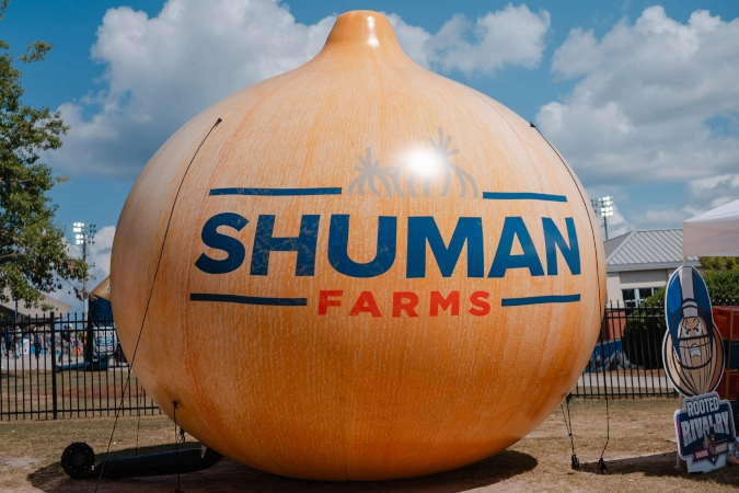 Giant inflatable Vidalia Onion with Shuman Farms logo. 