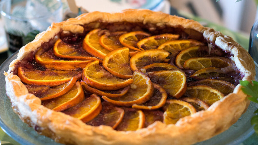 Homemade puff pastry tart with orange and chocolate.