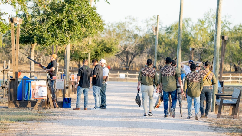 Participants skeet shooting.