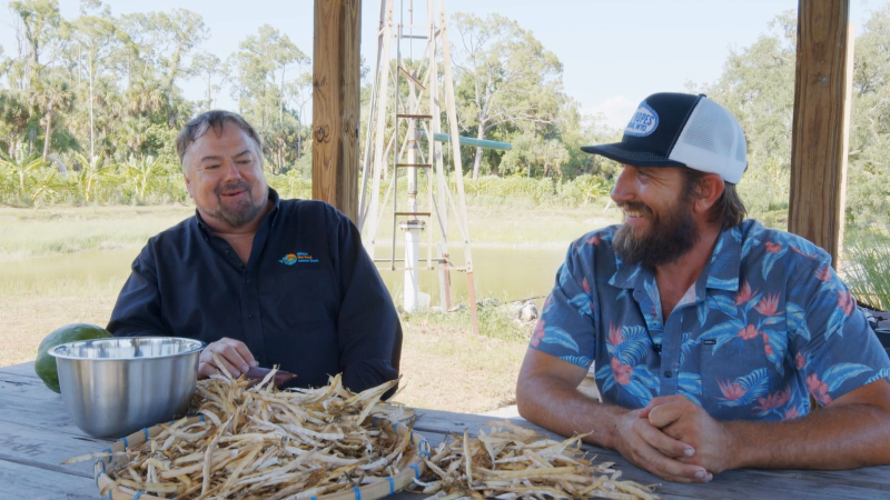 Chip and John Esker sitting on the farm.