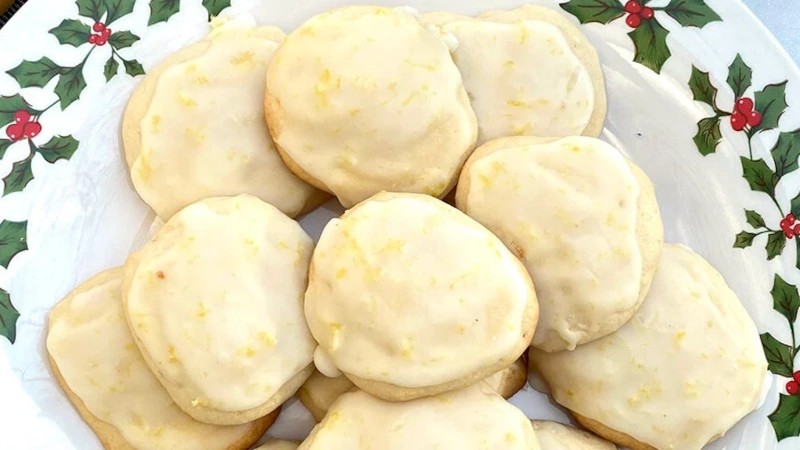 Glazed Lemon Ricotta Cookies on a plate.