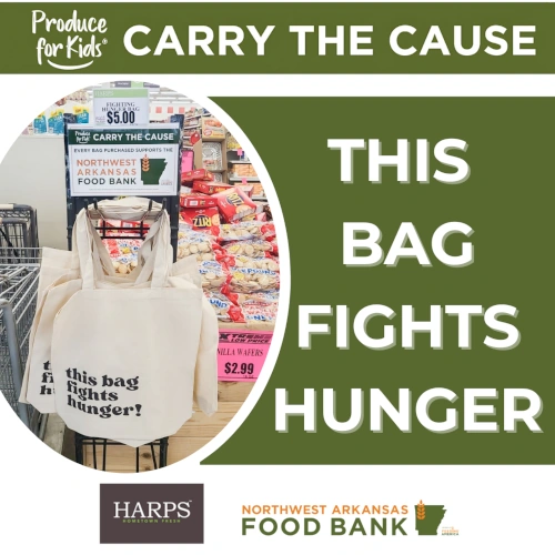 Store display for 'this bag fights hunger' tote bag.