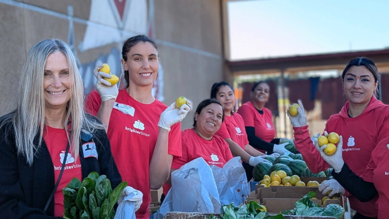 Volunteers sorting fresh produce.