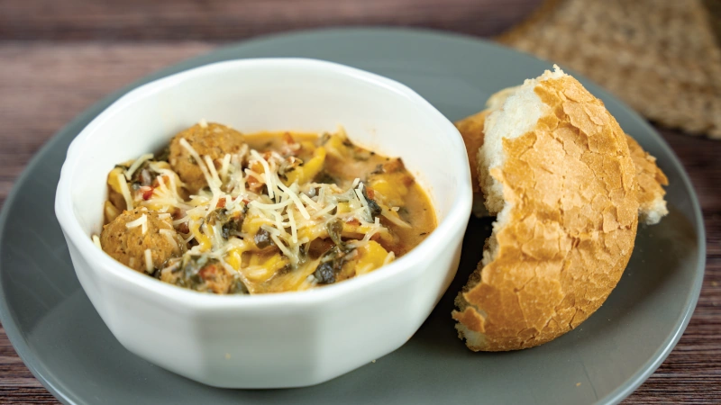 Bowl of meatball tortellini soup