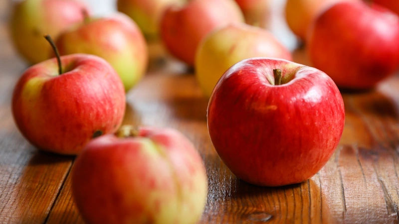 Crisp apples on a table.