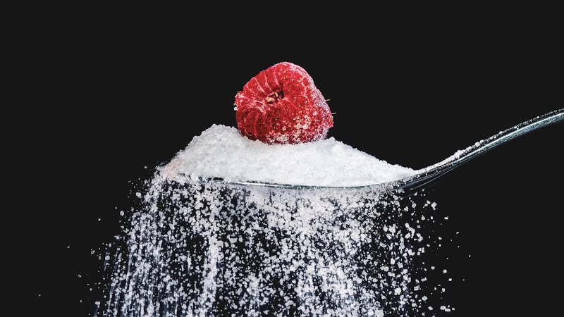 Raspberry on a spoonful of sugar