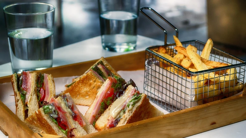 Club sandwich and fries.