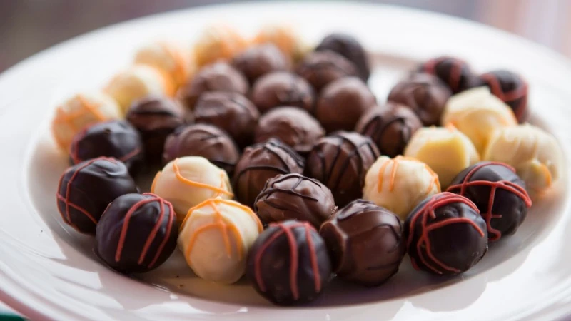 Bowl of assorted chocolate candies.