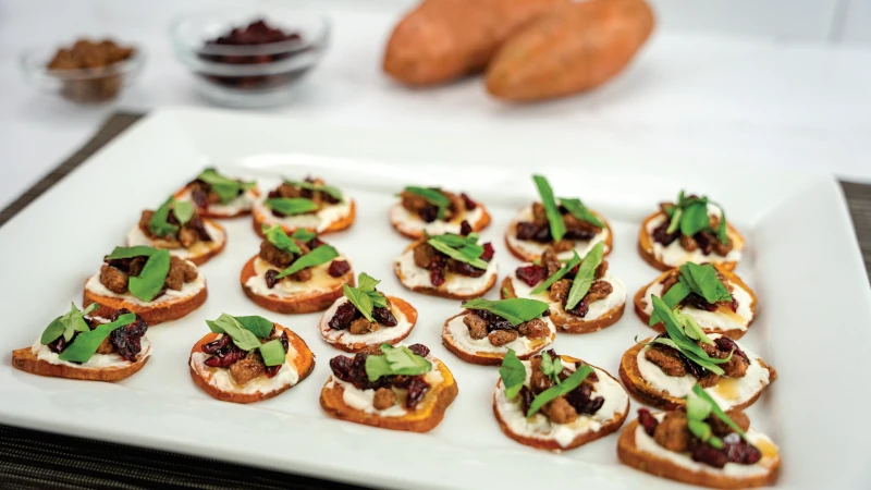 Baking sheet of sweetpotato goat cheese bites.