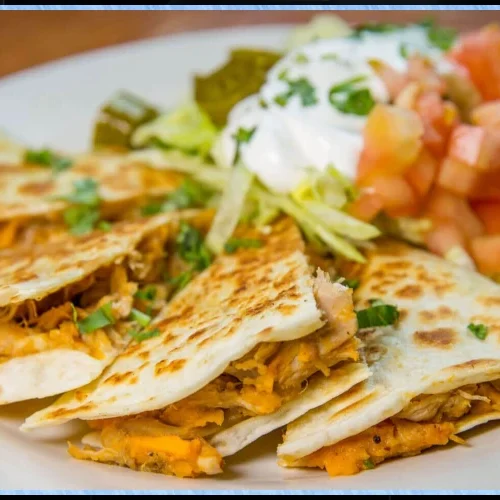 Plated pork sweetpotato quesadilla.