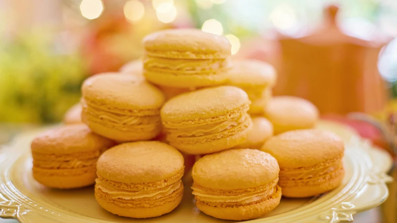 Plateful of yellow macarons.