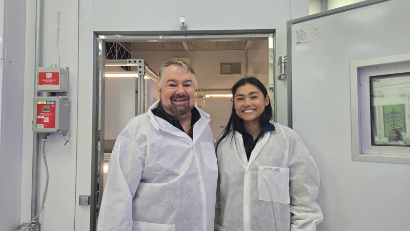 Man and woman in lab coats. 