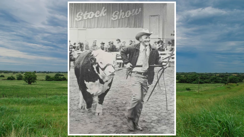 Glenn Klippenstein with a steer at the rodeo.