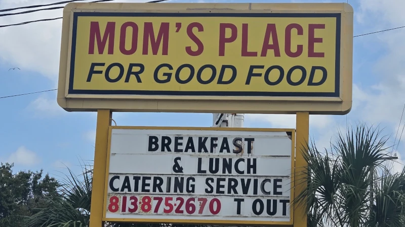Sign of the diner Mom's Place.