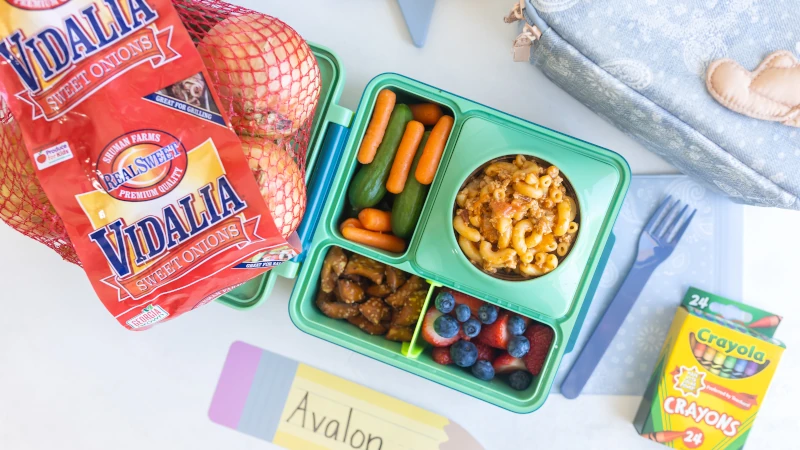 Tray of healthy food and bag of Vidalia onions.