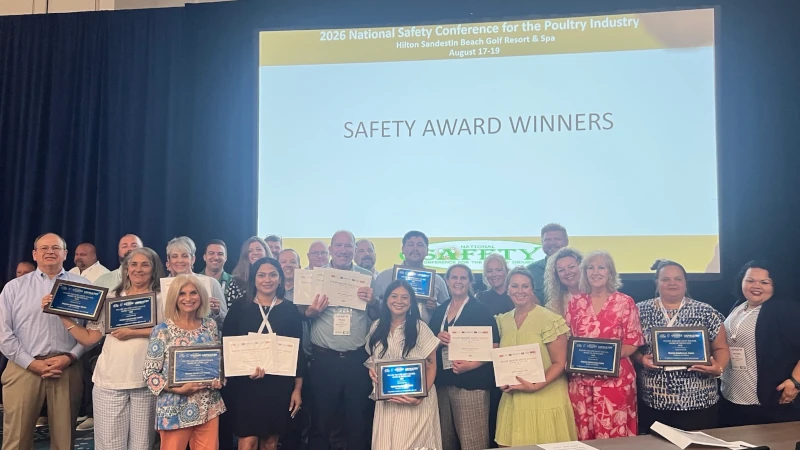 Group of people accepting awards.